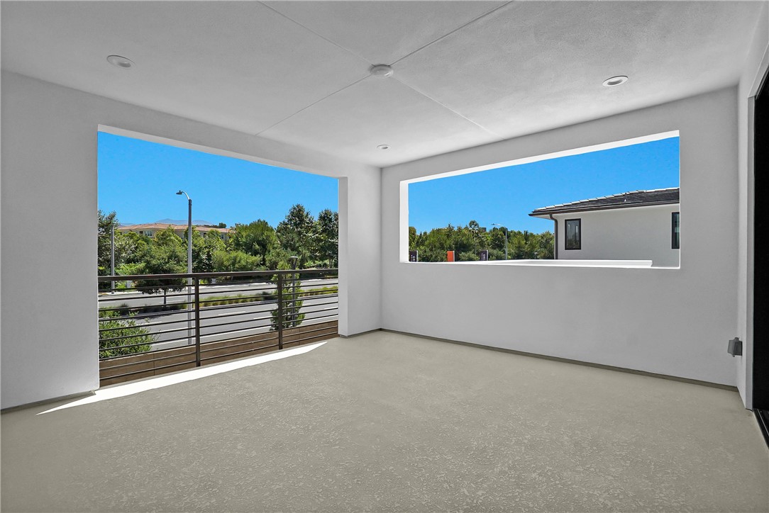 168 Creation Irvine, CA 92618 - Photo 50 of 59 a view of a room with wooden floor and windows