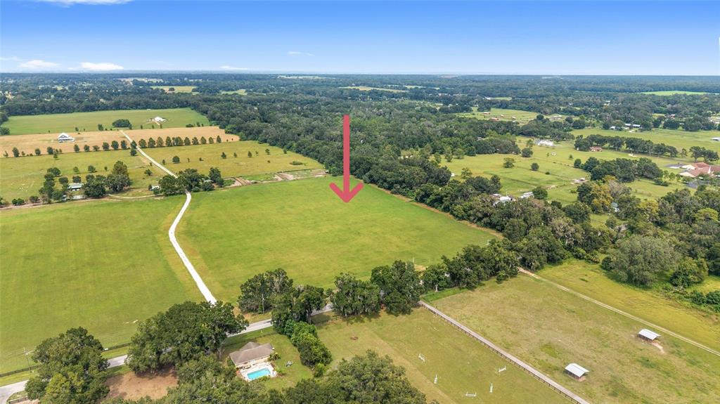 0 Northeast 8th Citra, FL 32113 - Photo 2 of 10 a view of a swimming pool with a yard