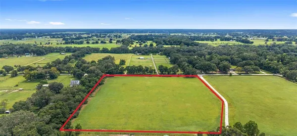 a view of a swimming pool and mountains