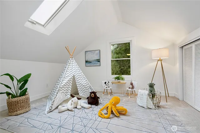 a view of a living room with a potted plant