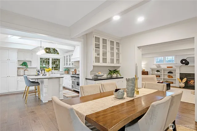a living room with kitchen island furniture and a wooden floor