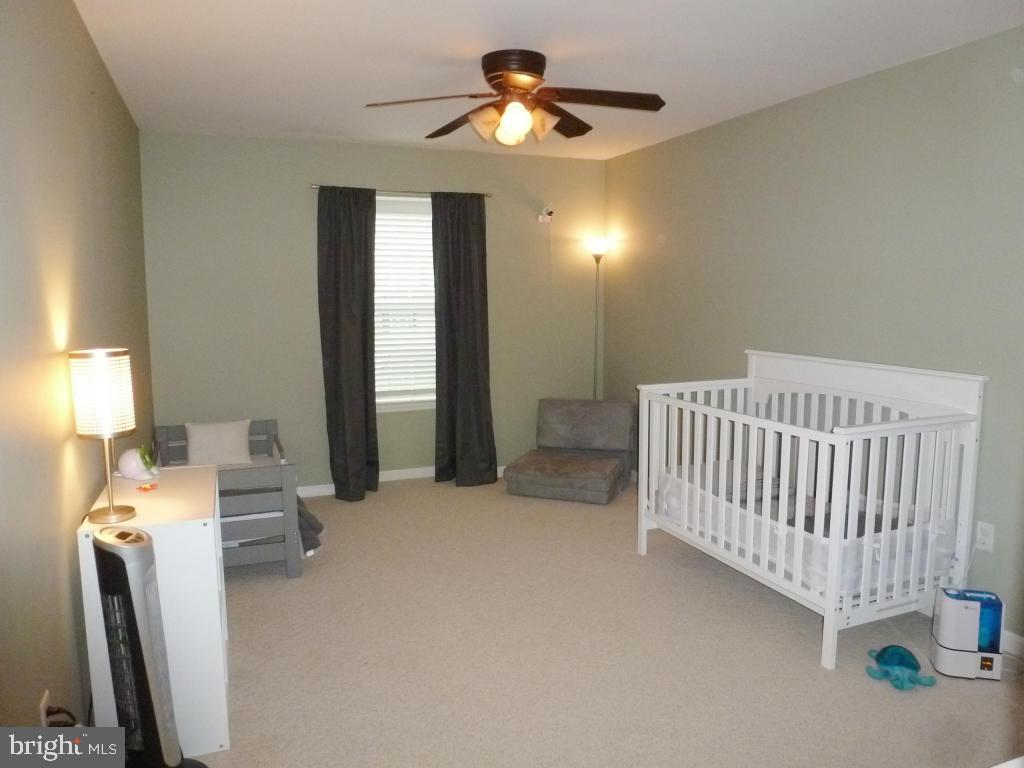 600 Chatham Way Lititz, PA 17543 - Photo 14 of 26 a view of a livingroom with furniture and a ceiling fan