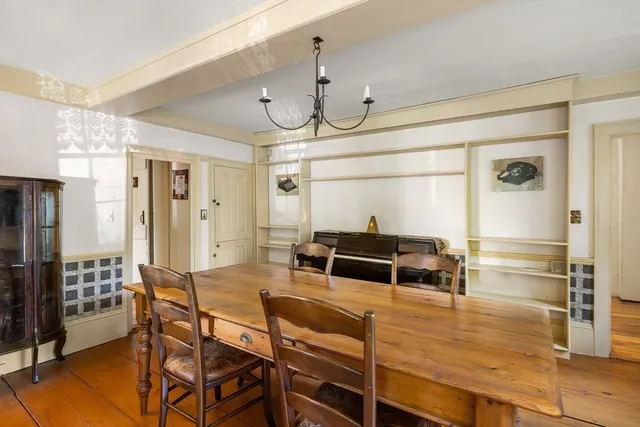 a outdoor space with a large window and stainless steel appliances
