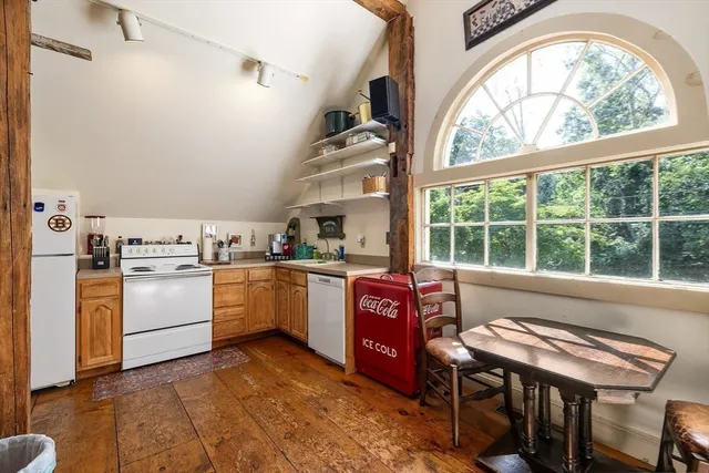 a bedroom with a bed and a walk in closet