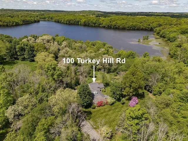 a view of a lake with a building in the background