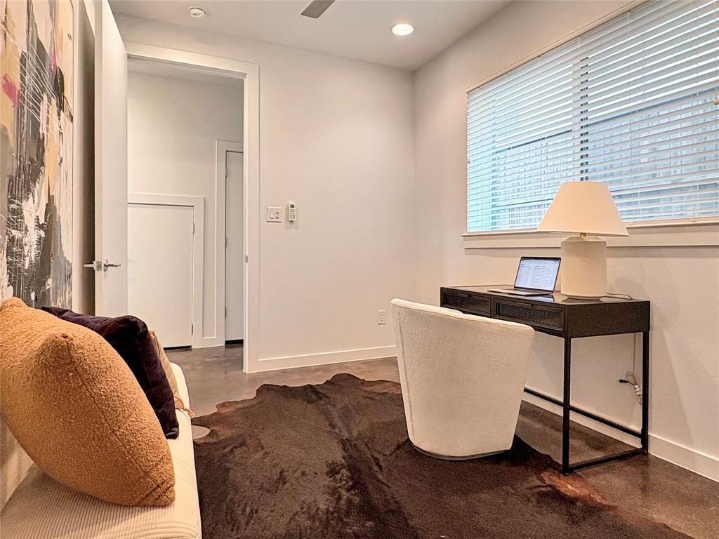 4934 Zuma Court Dallas, TX 75206 - Photo 17 of 22 a living room with a couch