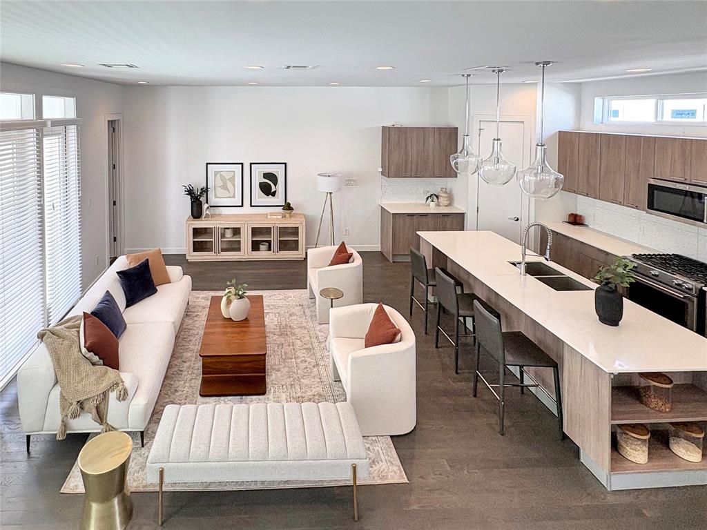 4934 Zuma Court Dallas, TX 75206 - Photo 2 of 22 a kitchen with a sink appliances and cabinets
