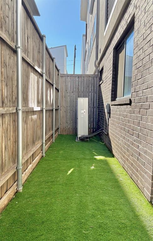 4934 Zuma Court Dallas, TX 75206 - Photo 21 of 22 a view of a back yard of the house with a garden