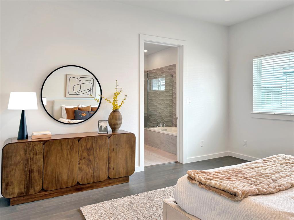 4934 Zuma Court Dallas, TX 75206 - Photo 10 of 22 a living room with a couch and a mirror