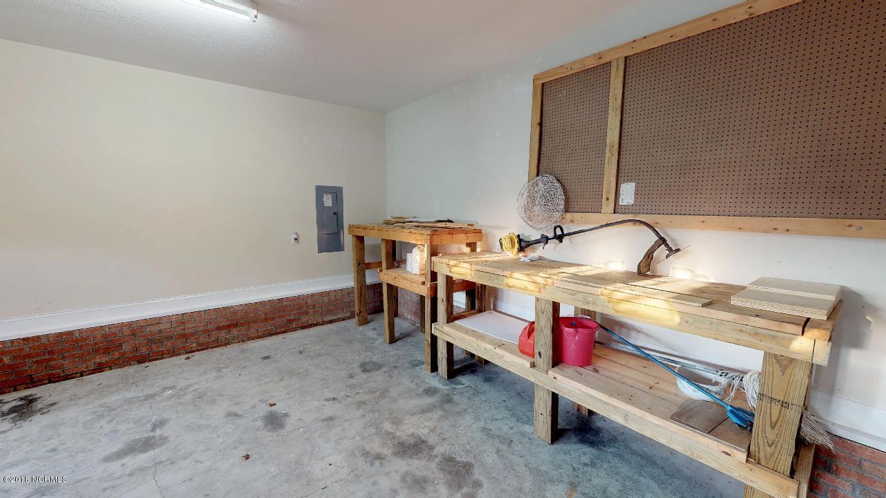 336 Old Dam Road Jacksonville, NC 28540 - Photo 26 of 34 336-Old-Dam-Road-Work-Bench-Area-Garage