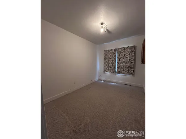 a view of a livingroom with a staircase