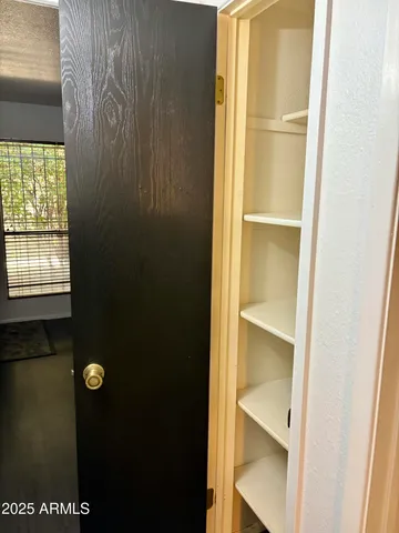 a bathroom with a sink a toilet and a shower