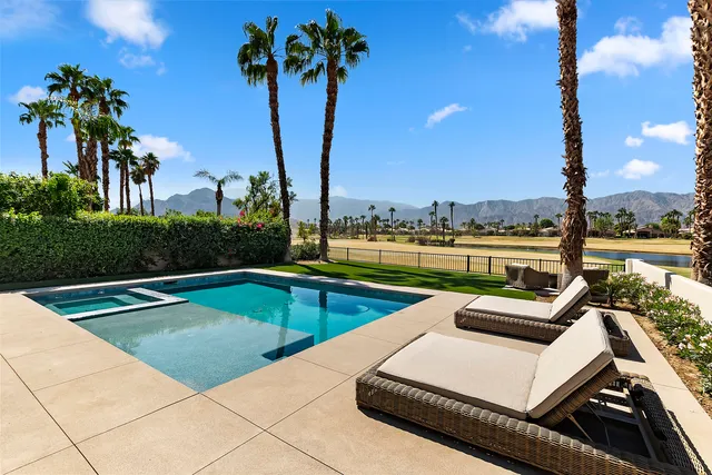 a view of a swimming pool with a terrace