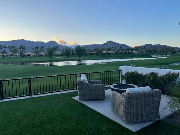 a view of a garden with lake view