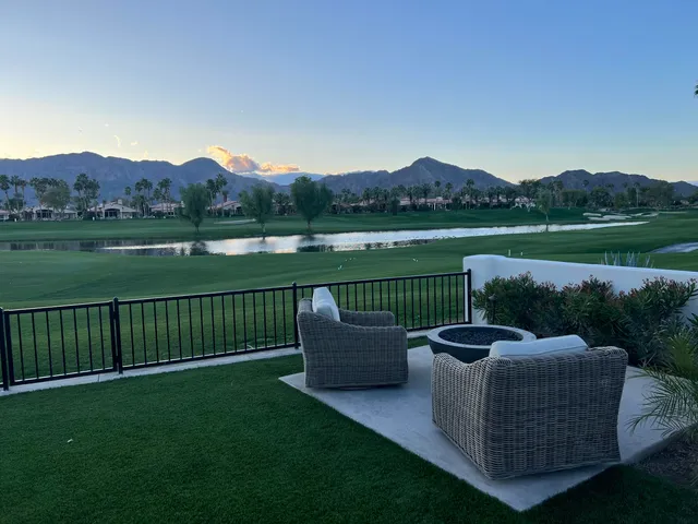 a view of a garden with lake view