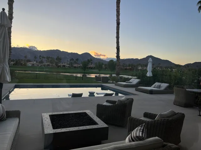 a view of a terrace with couches and a table