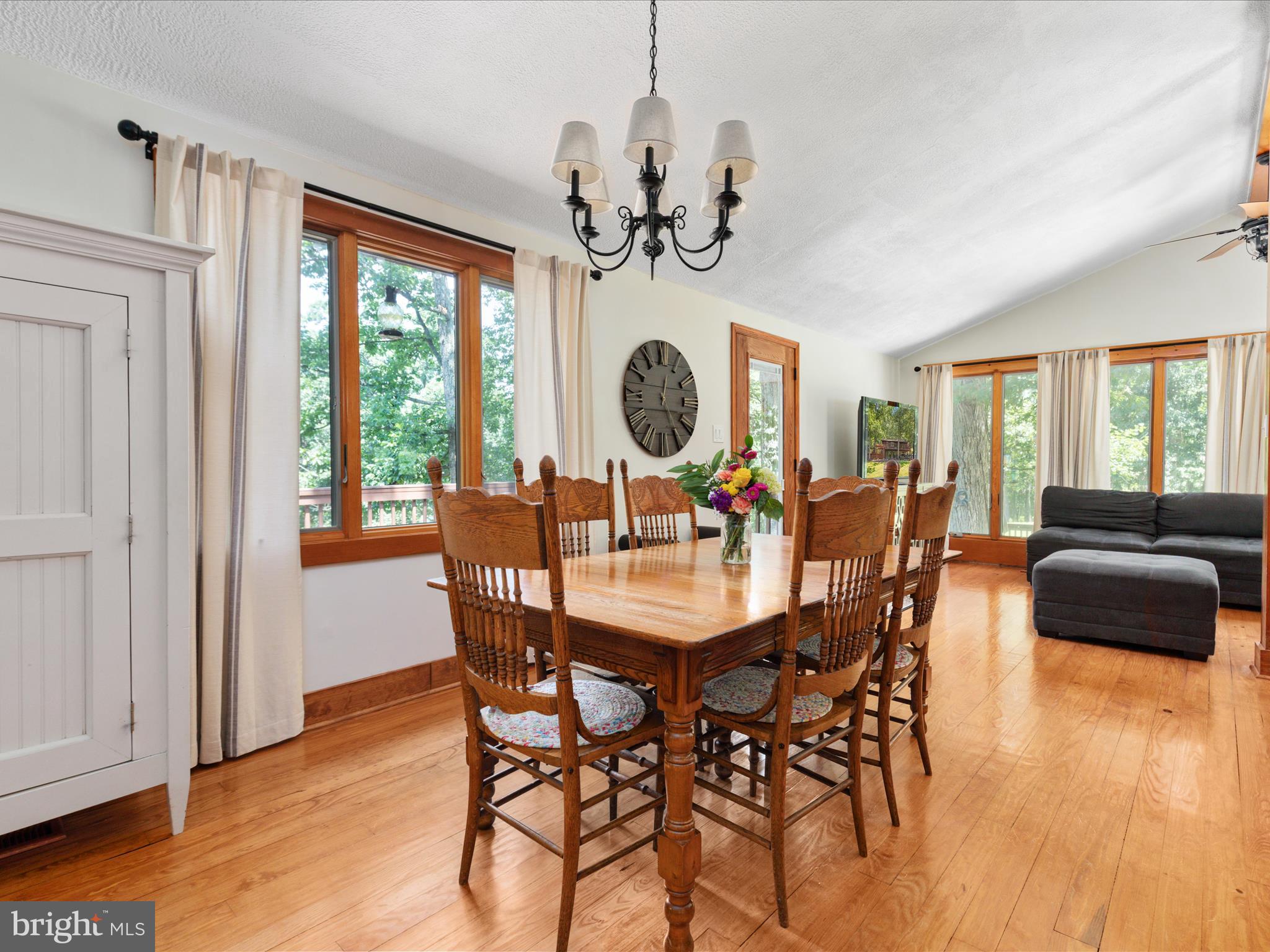 4327 Ebenezer Road Bluemont, VA 20135 - Photo 11 of 93 a view of a dining room with furniture window and wooden floor