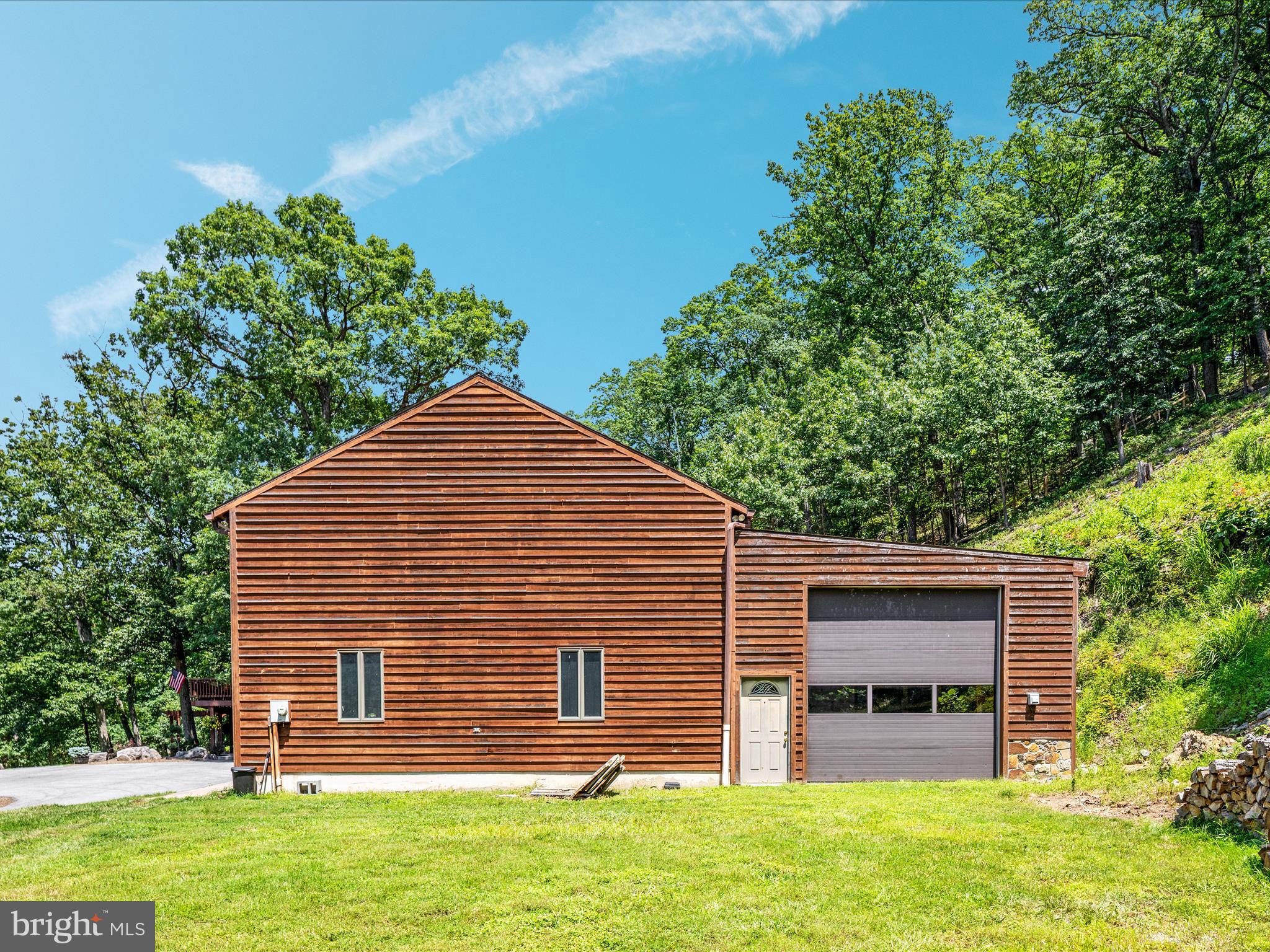 4327 Ebenezer Road Bluemont, VA 20135 - Photo 31 of 93 a front view of a house with a garden