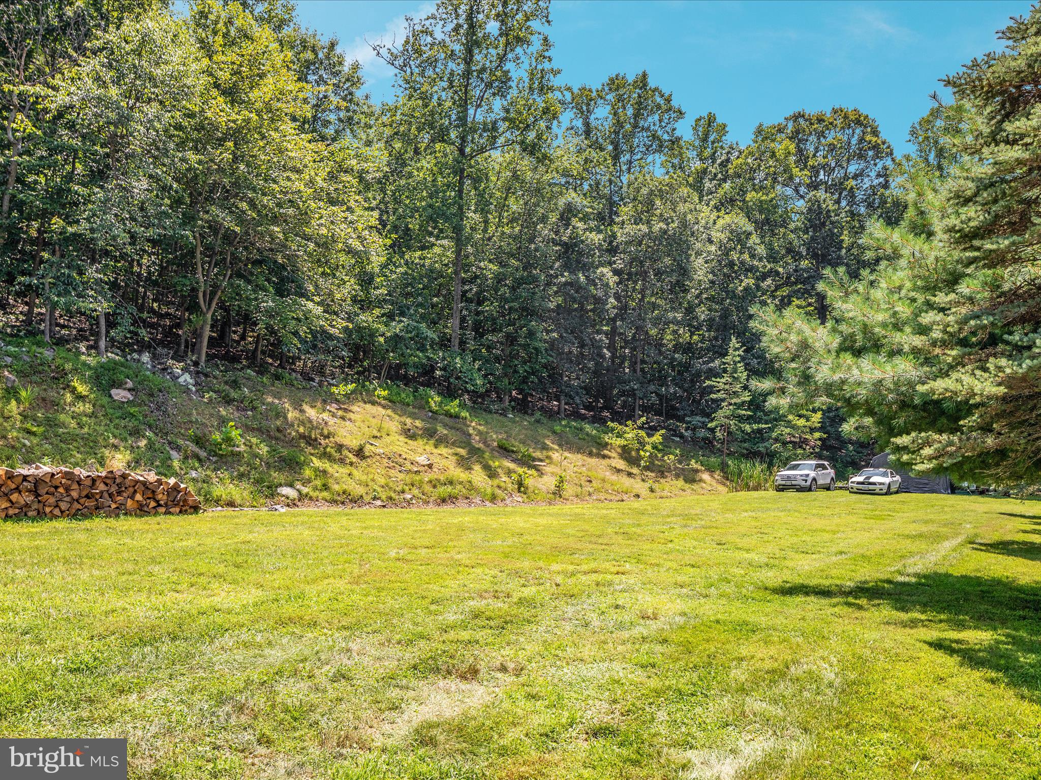 4327 Ebenezer Road Bluemont, VA 20135 - Photo 53 of 93 a view of a swimming pool with an outdoor space and seating area