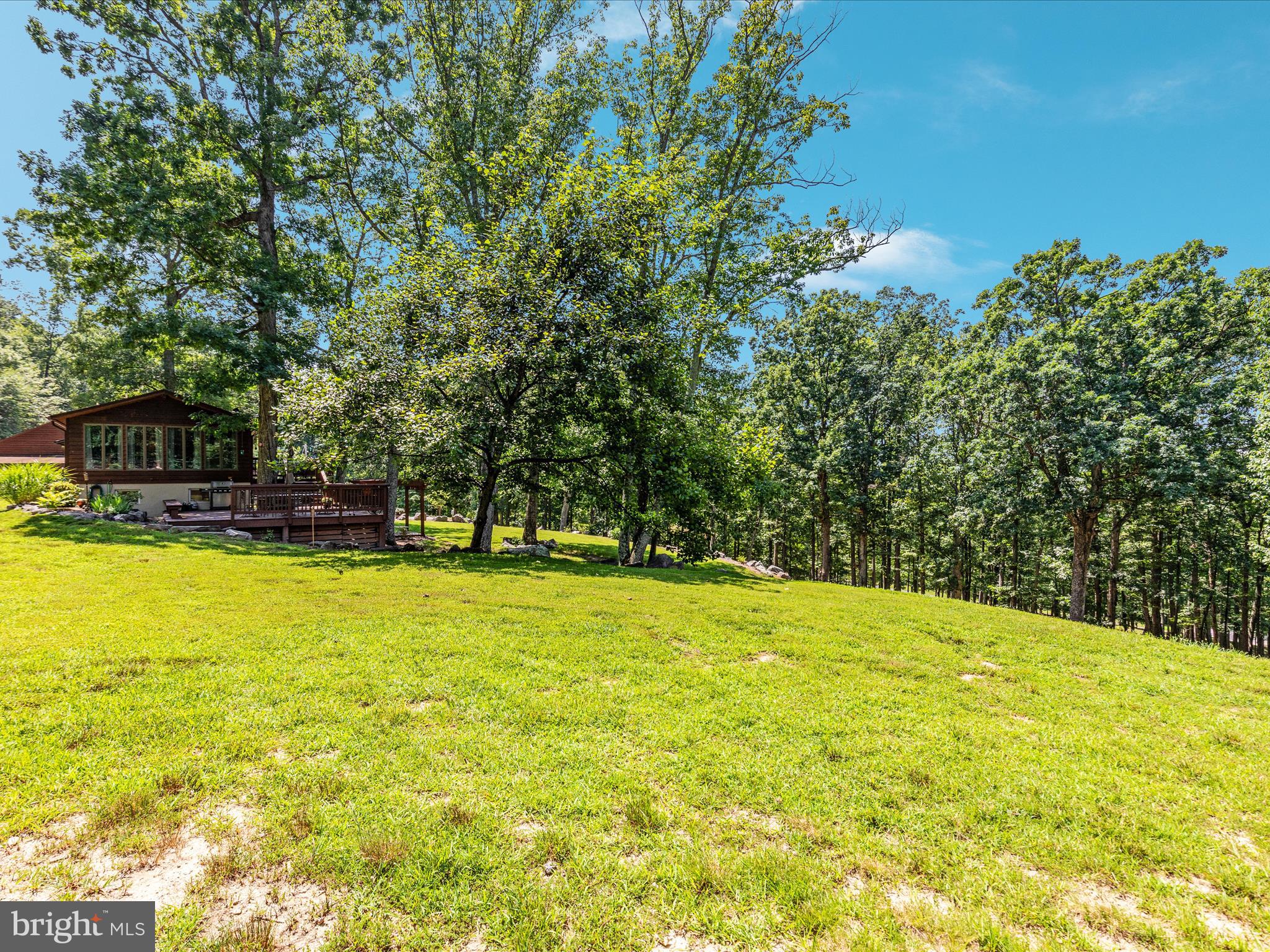 4327 Ebenezer Road Bluemont, VA 20135 - Photo 58 of 93 a view of a swimming pool with an outdoor space and seating area