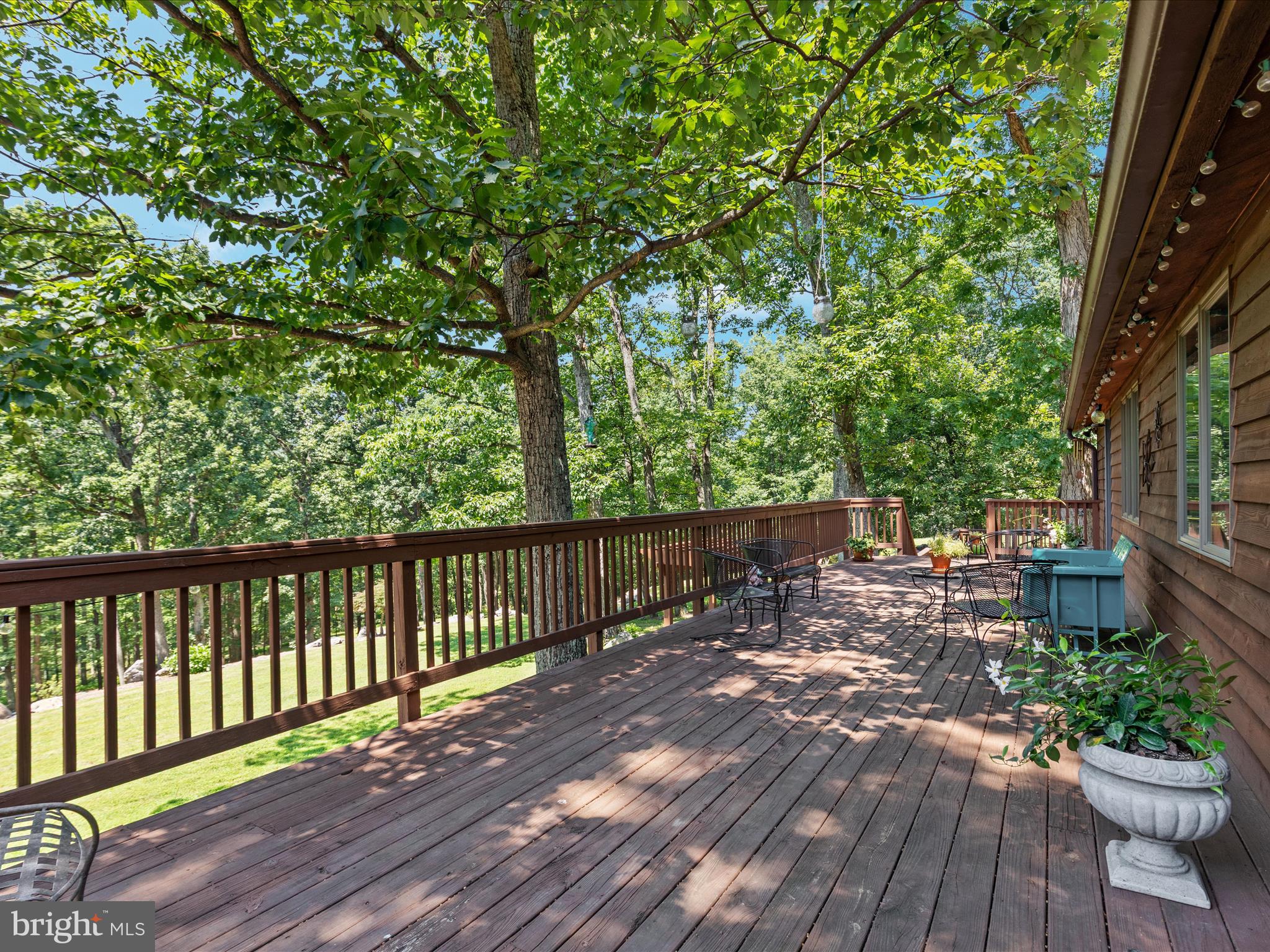 4327 Ebenezer Road Bluemont, VA 20135 - Photo 67 of 93 a view of balcony with wooden floor and outdoor seating