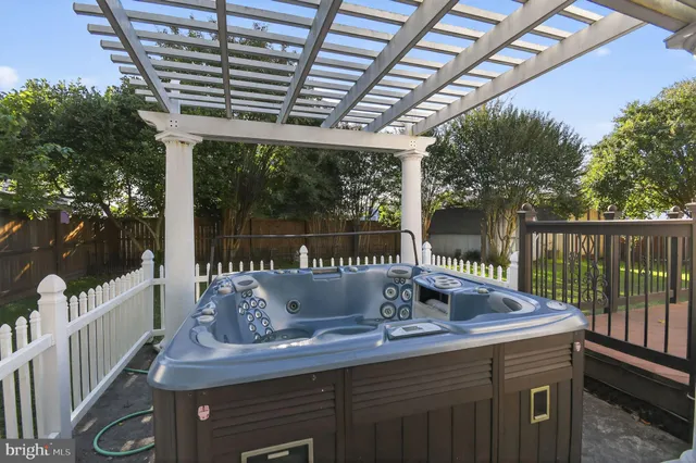 a view of a backyard with sitting area