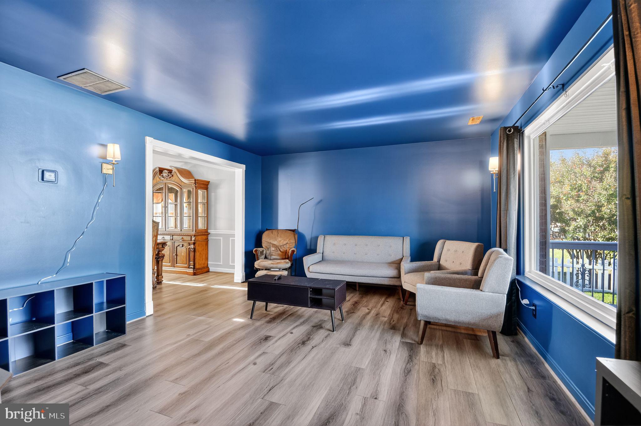 22040 Caravel Court Great Mills, MD 20634 - Photo 13 of 32 a living room with furniture and a wooden floor