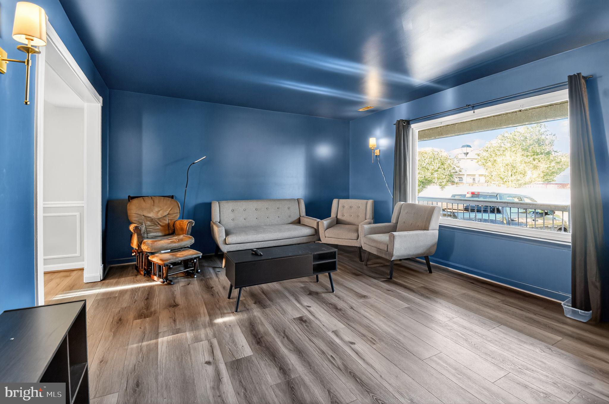 22040 Caravel Court Great Mills, MD 20634 - Photo 18 of 32 a living room with furniture and a large window
