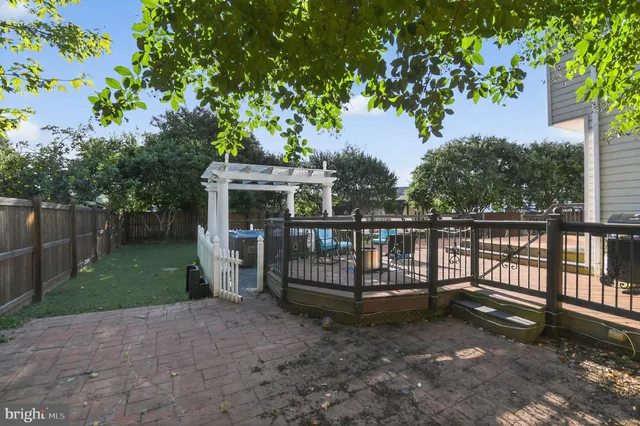 a backyard of a house with seating space