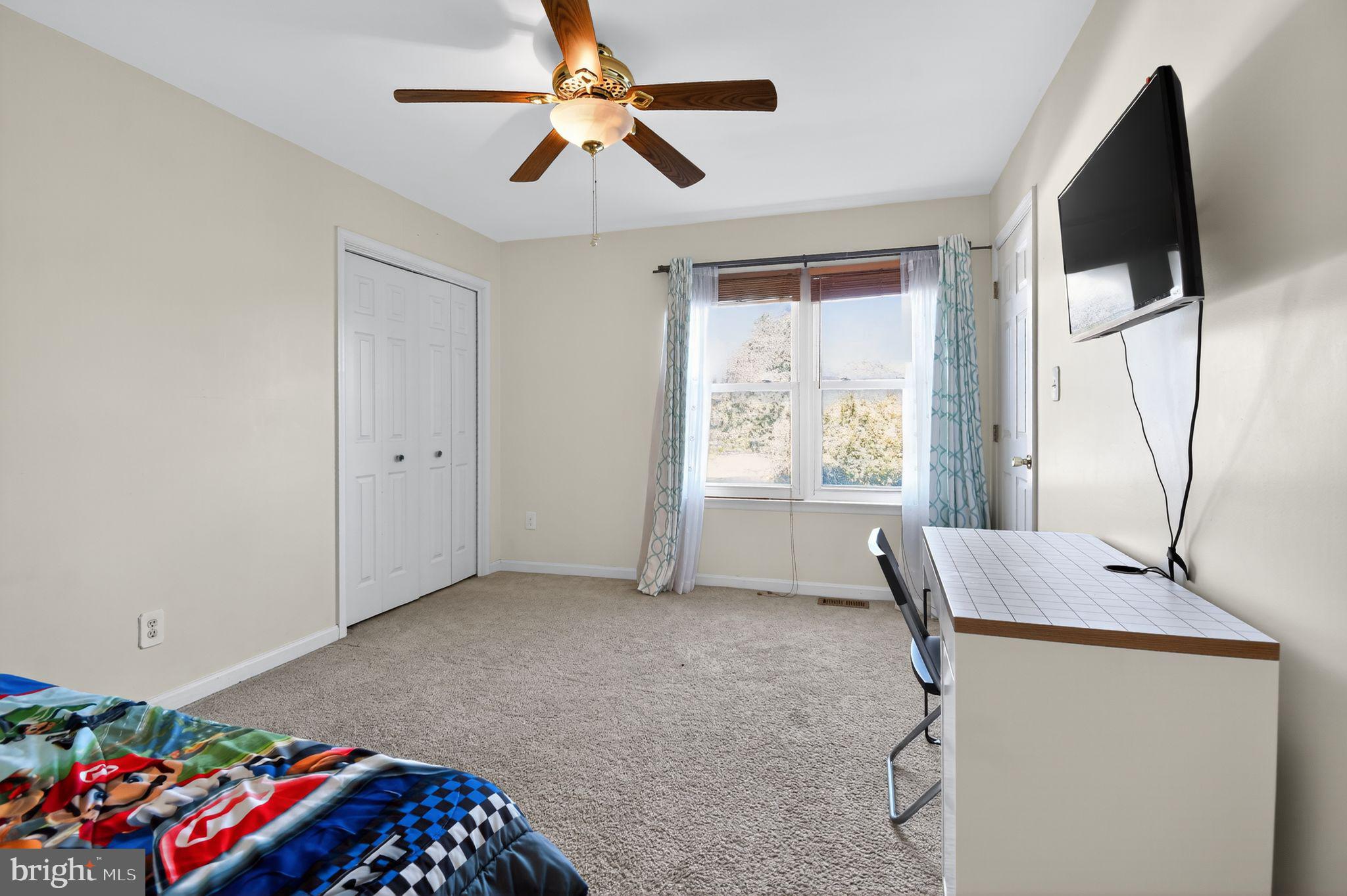 22040 Caravel Court Great Mills, MD 20634 - Photo 22 of 32 a bedroom with furniture and a window
