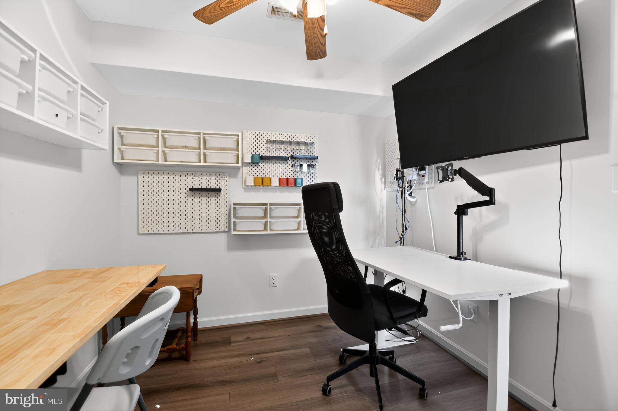 22040 Caravel Court Great Mills, MD 20634 - Photo 27 of 32 a view of a workspace with furniture and wooden floor