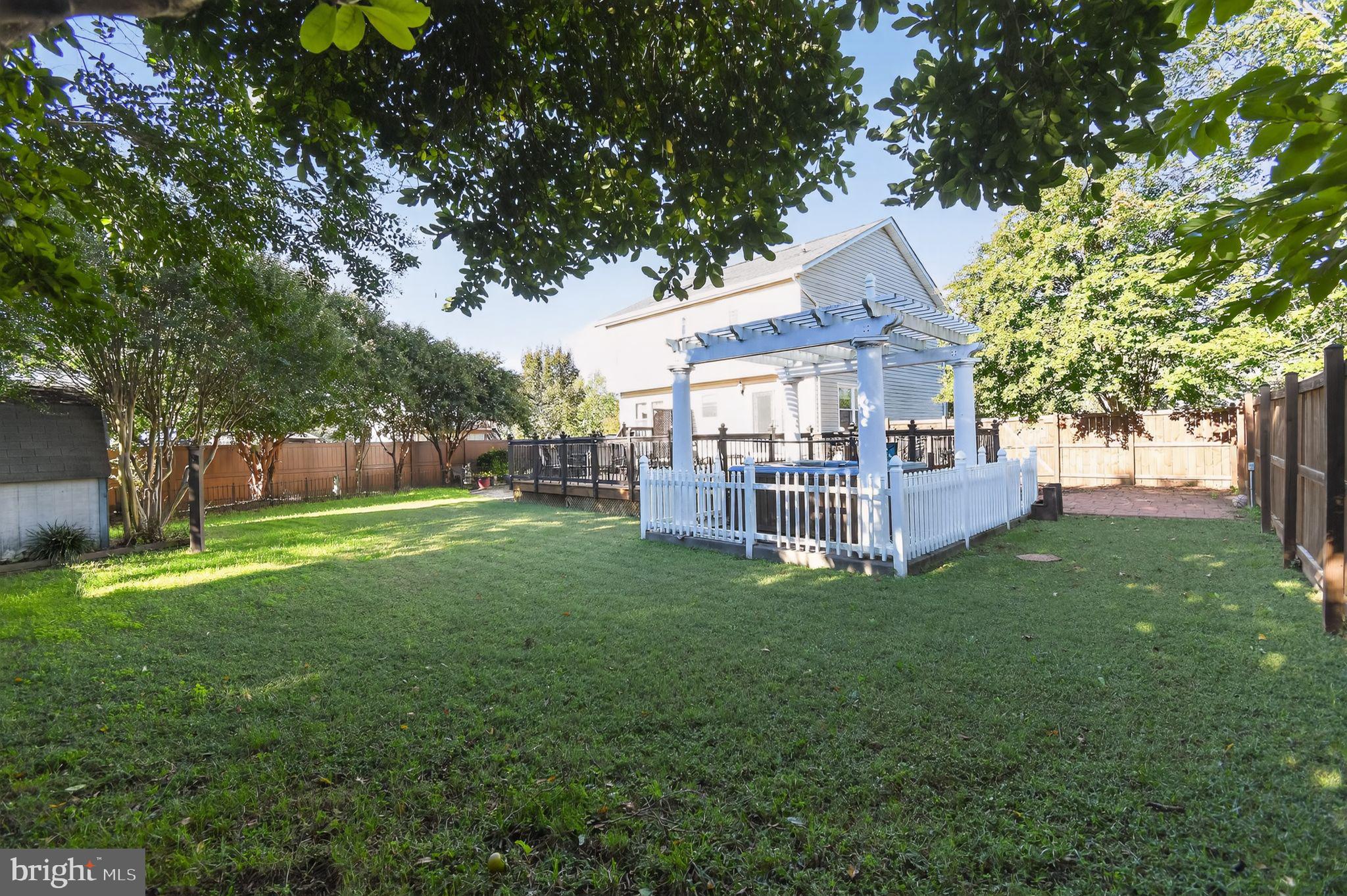 22040 Caravel Court Great Mills, MD 20634 - Photo 29 of 32 a view of a house with a yard and sitting area
