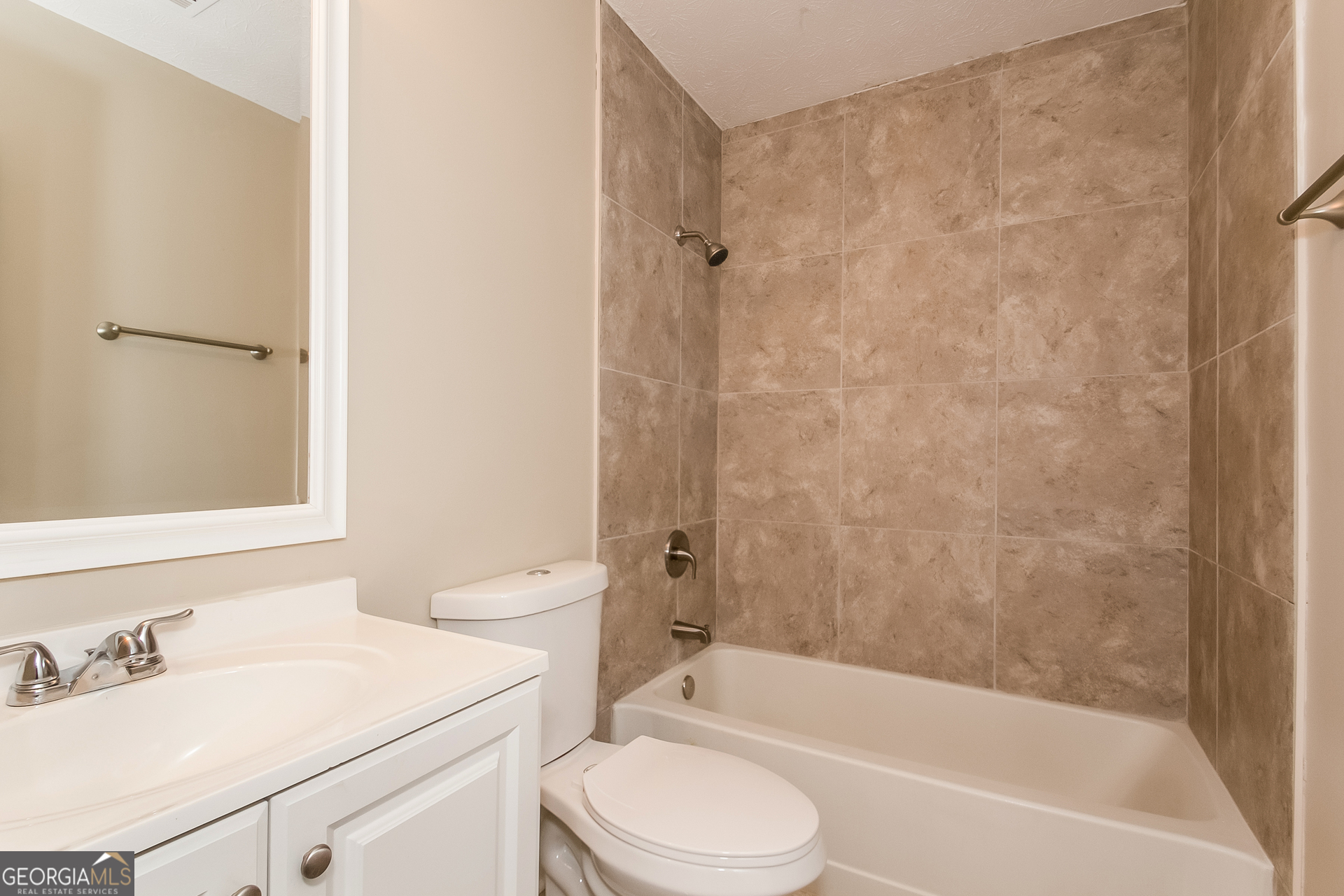 606 Wilson Mill Road Southwest Atlanta, GA 30331 - Photo 14 of 15 a bathroom with a sink toilet and shower
