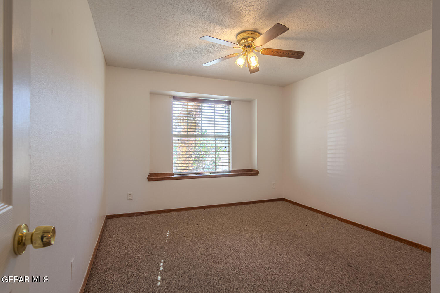 12259 Tierra Loma Road El Paso, TX 79938 - Photo 27 of 73 an empty room with a window
