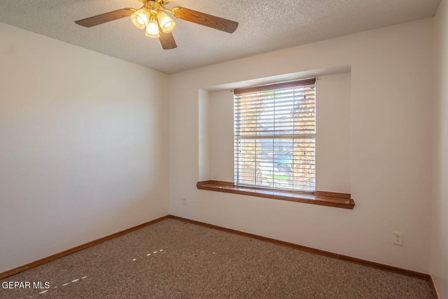 12259 Tierra Loma Road El Paso, TX 79938 - Photo 29 of 73 an empty room with a window