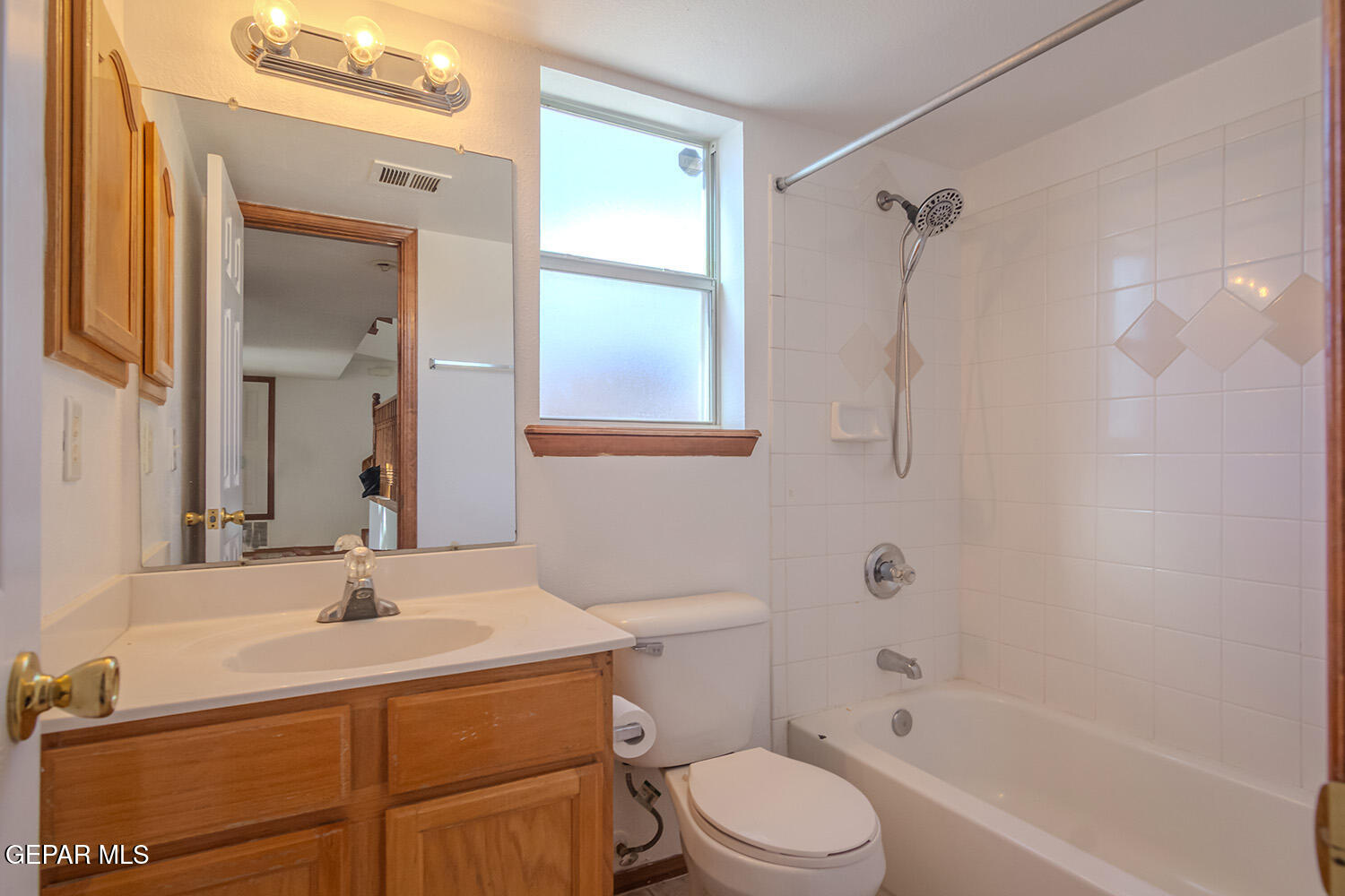 12259 Tierra Loma Road El Paso, TX 79938 - Photo 30 of 73 a bathroom with a sink a toilet and shower