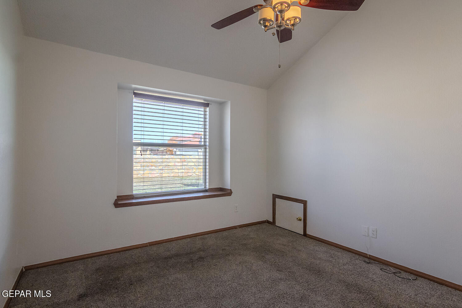 12259 Tierra Loma Road El Paso, TX 79938 - Photo 33 of 73 an empty room with a window