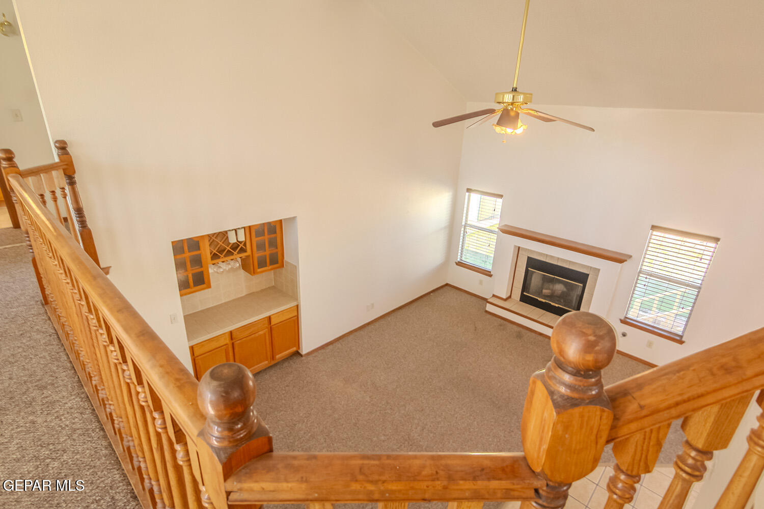 12259 Tierra Loma Road El Paso, TX 79938 - Photo 40 of 73 a view of stairs and hall with wooden floor
