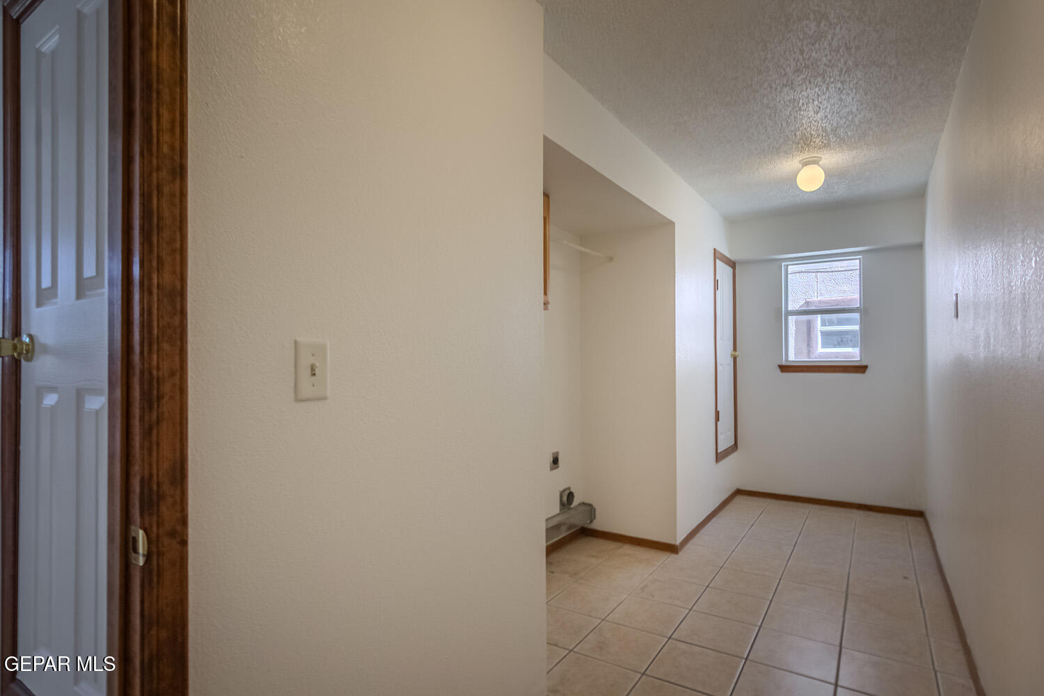12259 Tierra Loma Road El Paso, TX 79938 - Photo 9 of 73 a view of a hallway with closet