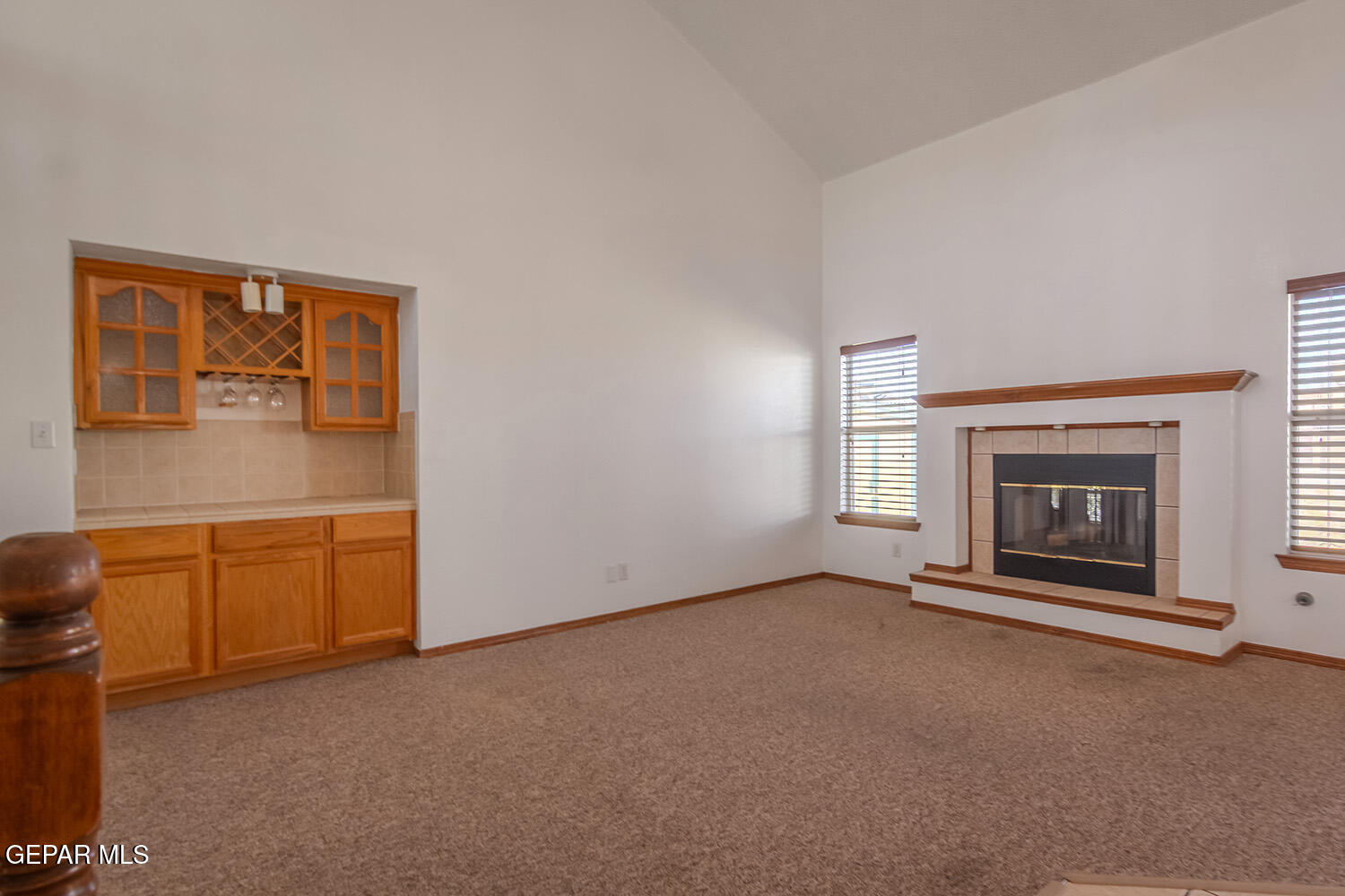 12259 Tierra Loma Road El Paso, TX 79938 - Photo 10 of 73 a view of an empty room with a fireplace and a window