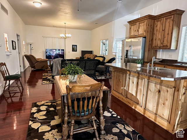 2855 South 1000 West Perry, UT 84302 - Photo 83 of 142 ADU - Dining space with dark wood-style floors and a chandelier