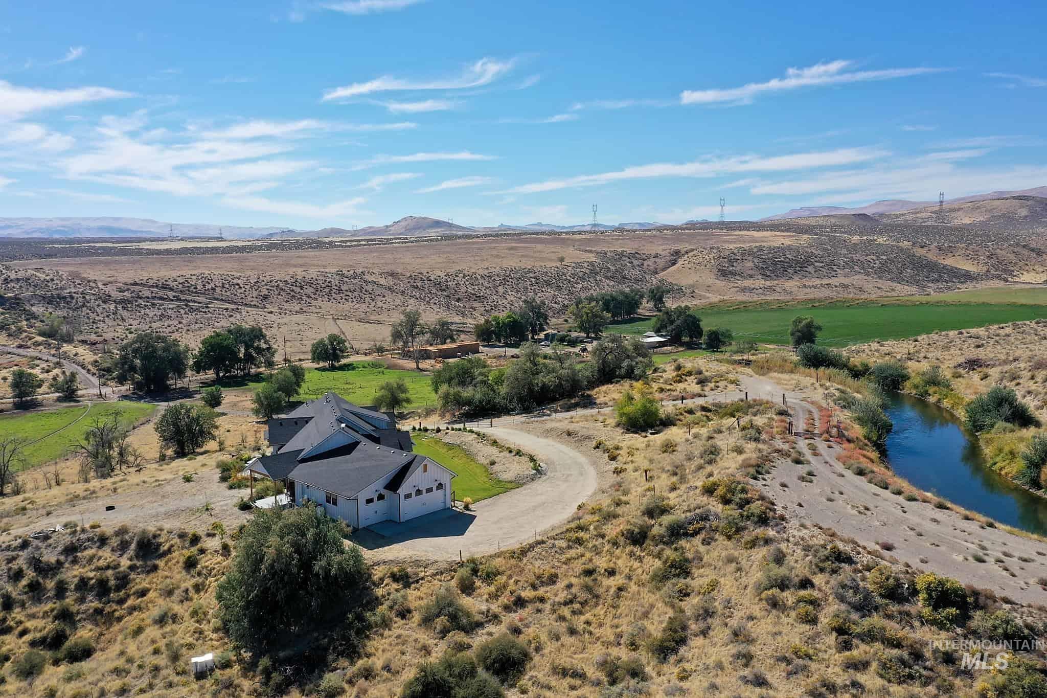 876 Coyote Gulch Road Adrian, OR 97901 - Photo 45 of 50 Contemporary residence with a multi-gabled roofline and attached three-car garage