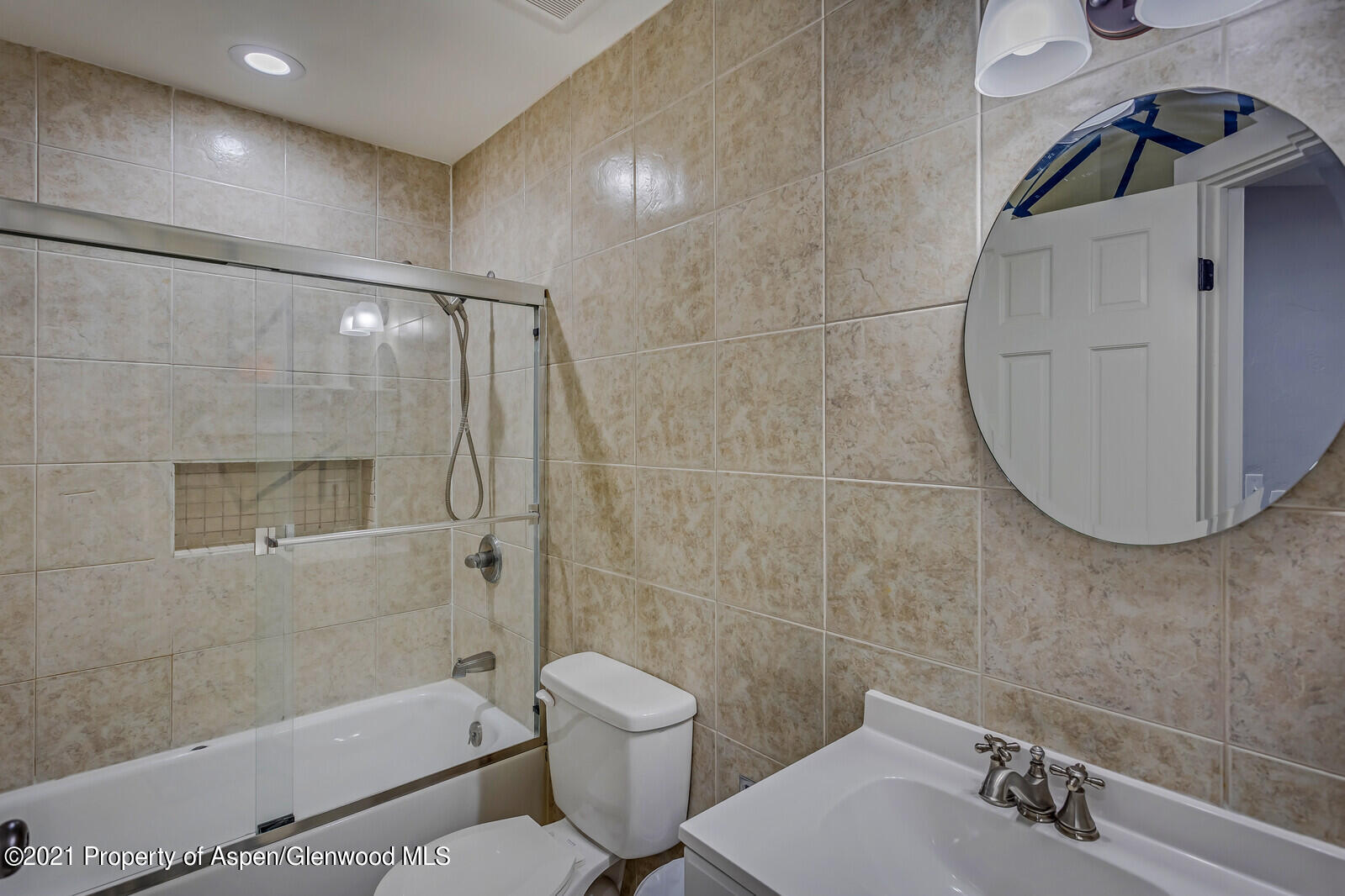 265 Badger Road El Jebel, CO 81623 - Photo 18 of 27 a bathroom with a sink toilet and shower