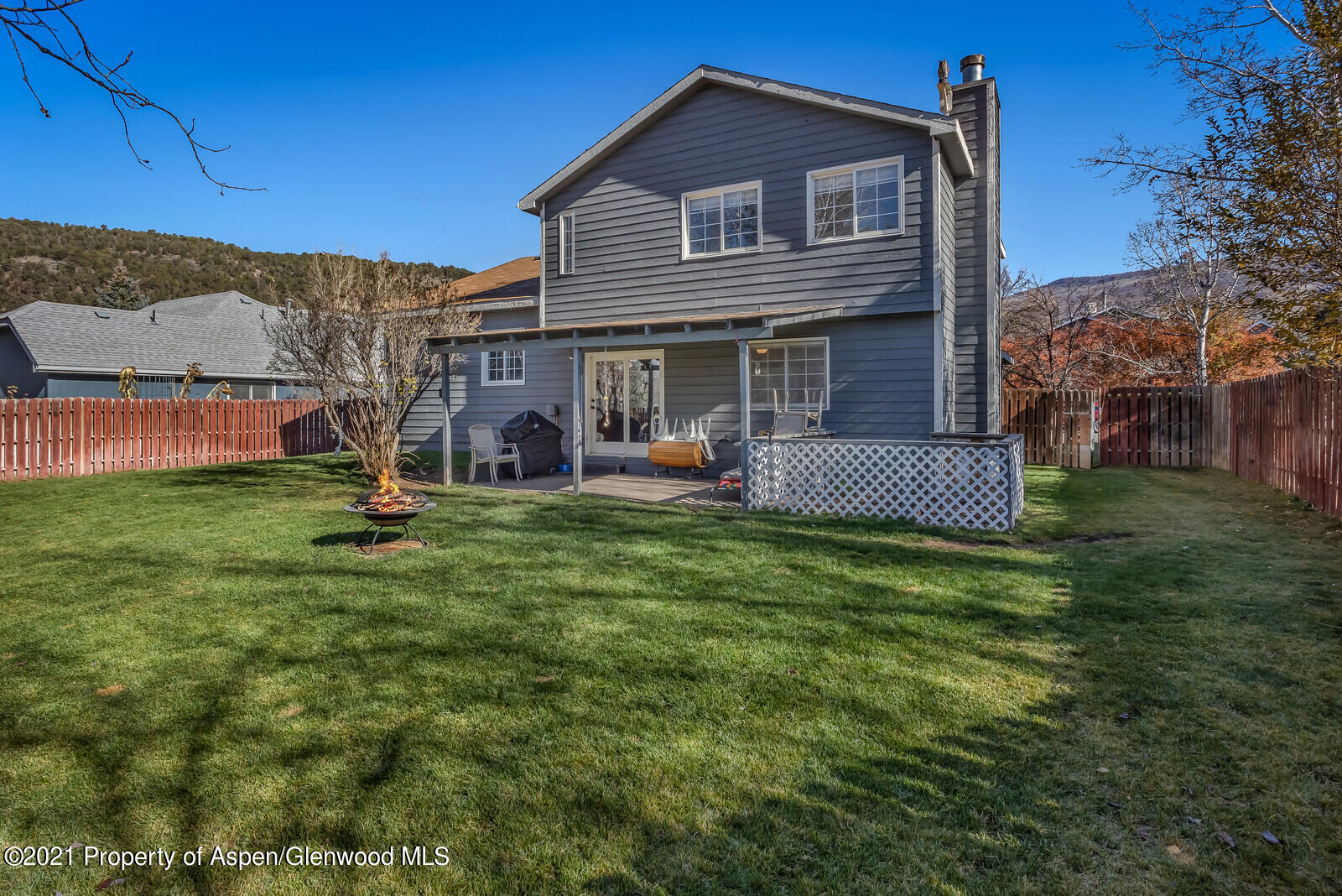 265 Badger Road El Jebel, CO 81623 - Photo 19 of 27 a front view of a house with a yard