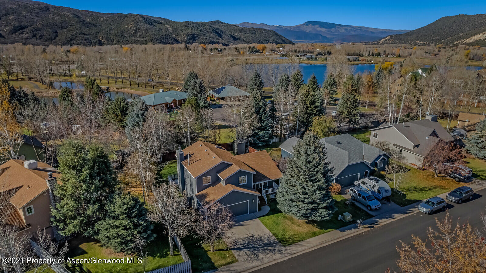 265 Badger Road El Jebel, CO 81623 - Photo 26 of 27 an aerial view of a house with a lake view