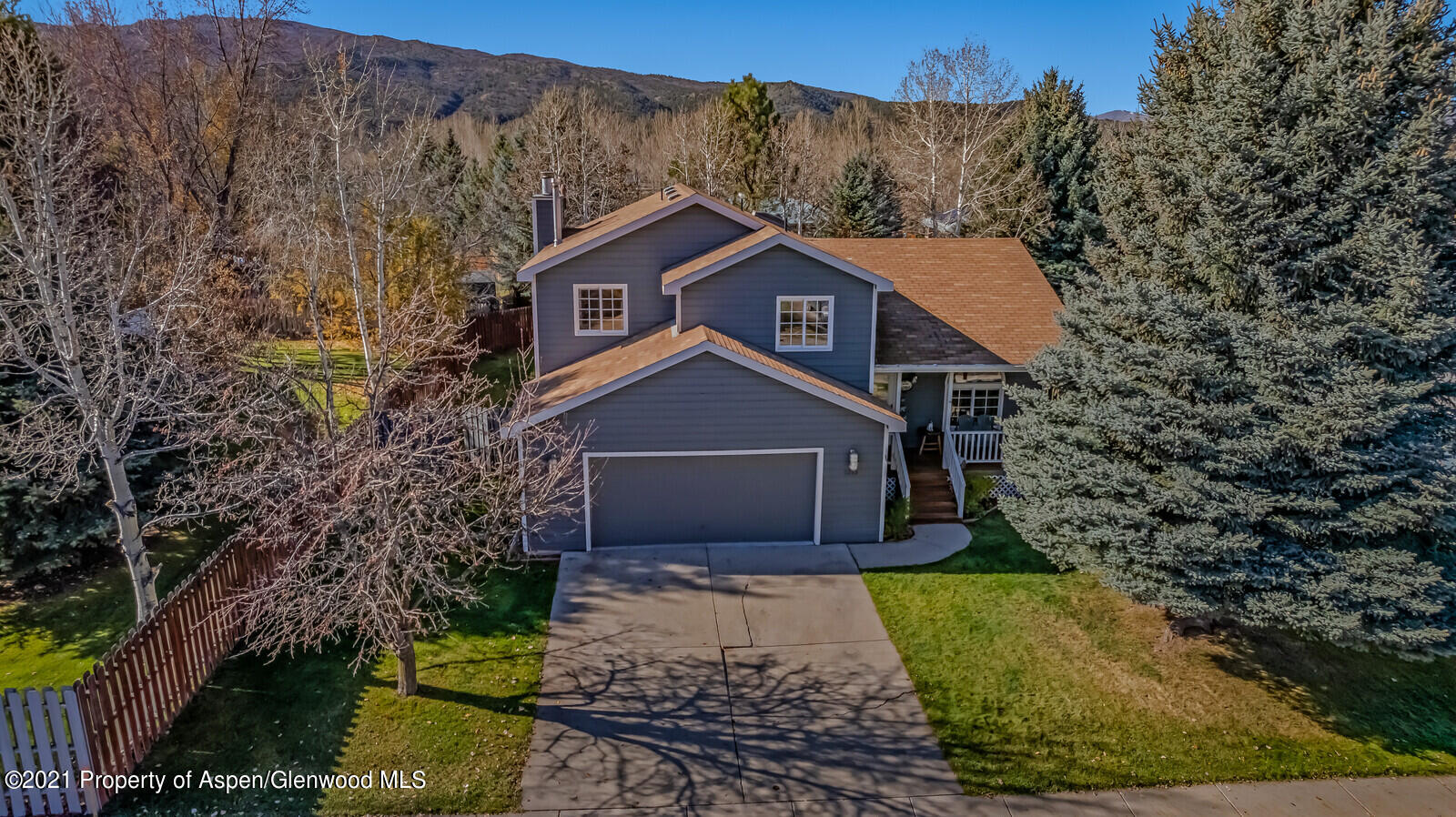 265 Badger Road El Jebel, CO 81623 - Photo 27 of 27 a front view of a house with a yard