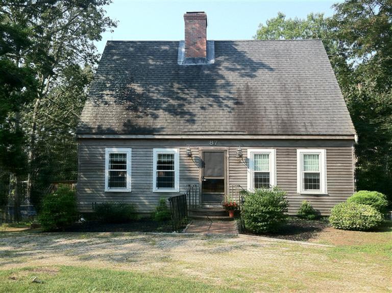 87 Chatham Road Harwich, MA 02645 - Photo 1 of 15 a front view of a house with garden