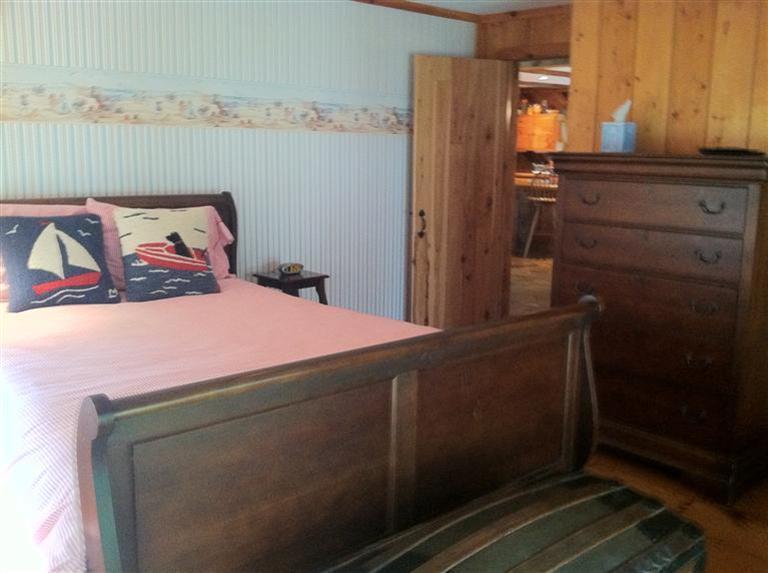 87 Chatham Road Harwich, MA 02645 - Photo 11 of 15 a bedroom with a bed and a dresser
