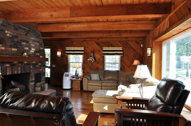 87 Chatham Road Harwich, MA 02645 - Photo 6 of 15 a living room with furniture and a fireplace