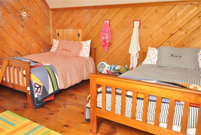 87 Chatham Road Harwich, MA 02645 - Photo 8 of 15 a bedroom with a bed and a window
